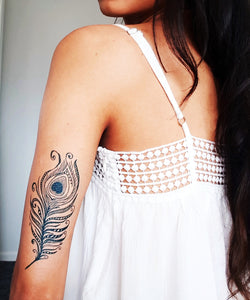 Feather tattoo on model